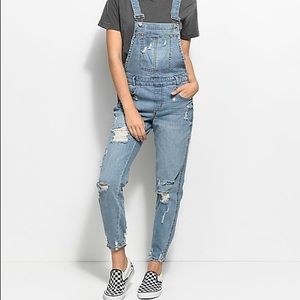 Light wash distressed women’s overalls